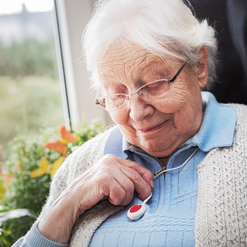 Elderly person with emergency button